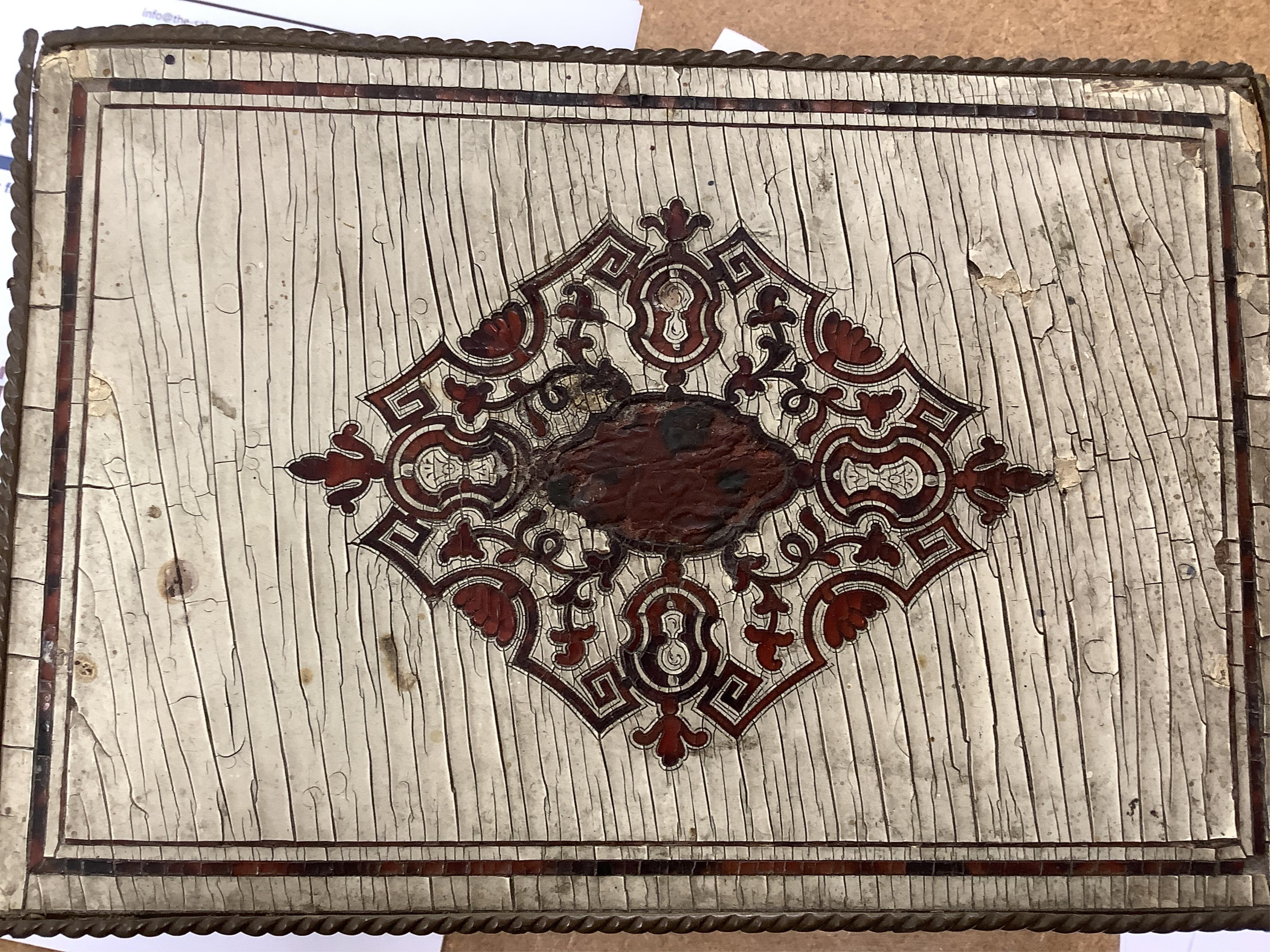 A 19th-century French tortoiseshell and faux lacquer work box, 24.5cm wide x 11.5cm high. Condition - poor to fair